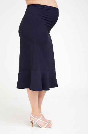 אישה לובשת חצאית הריון אדלה נייבי - אבישג ארבל