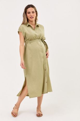 אישה לובשת שמלת הריון נדין ירוקה