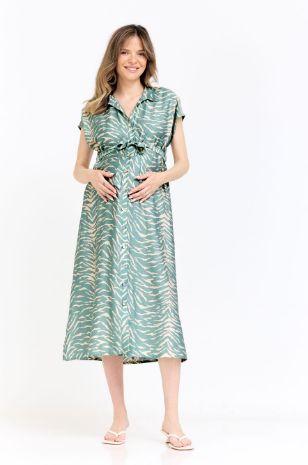 אישה לובשת שמלת הריון ליהיא שמנת מרווה של אבישג ארבל